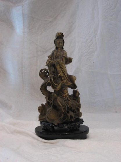 Guan Yin riding on dragon