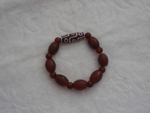 9-eyes dzi bead bracelet - Image 4