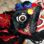 Chinese puppet lion (in black)